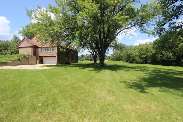 view of yard with a garage