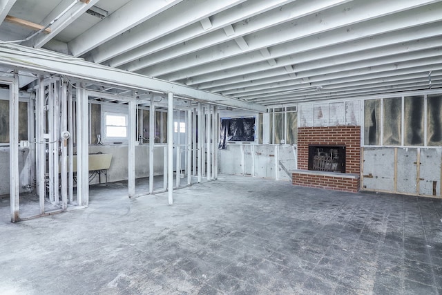 basement featuring a fireplace