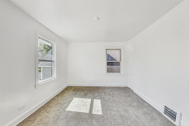 unfurnished room with carpet floors