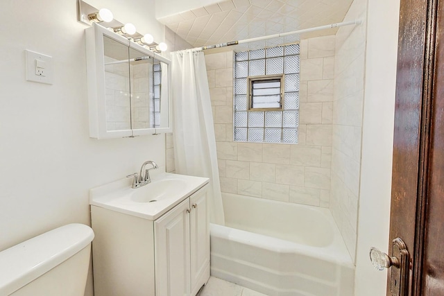 full bathroom featuring vanity, toilet, and shower / tub combo with curtain