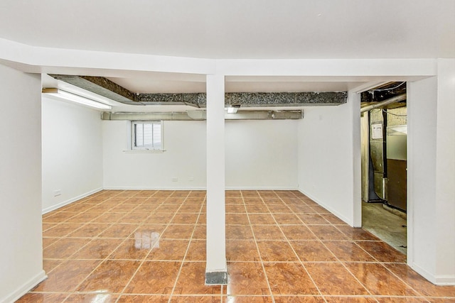 basement featuring tile patterned flooring