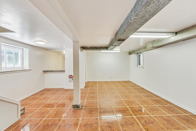 basement with tile patterned floors