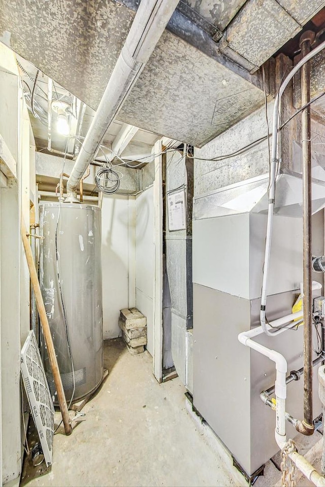 basement with heating unit and water heater