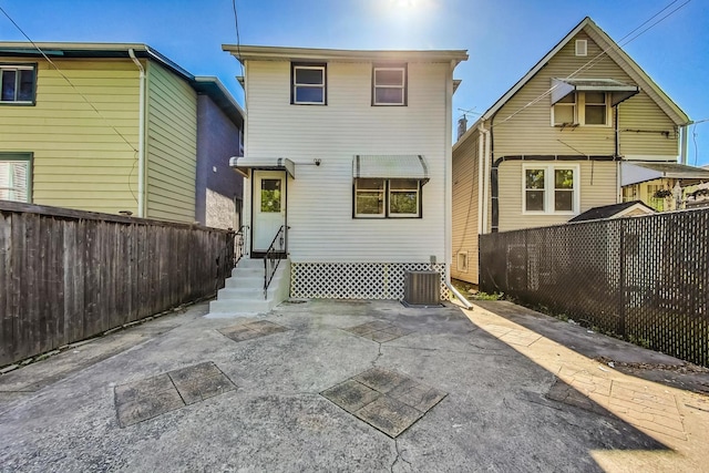 rear view of property with a patio area