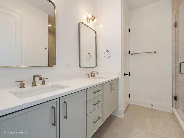 bathroom with vanity, tile patterned floors, and a shower with shower door