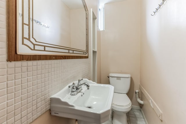 bathroom with toilet and sink