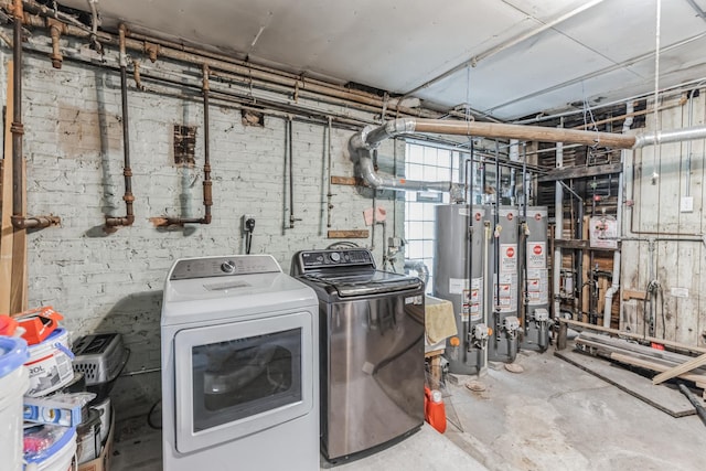 washroom featuring washer and clothes dryer and gas water heater