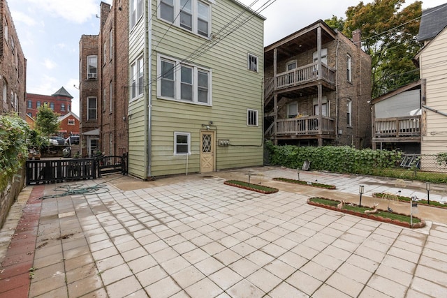 rear view of house featuring a patio area