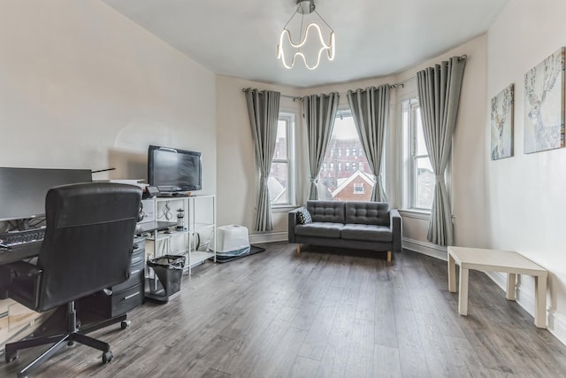 office featuring a chandelier and wood-type flooring