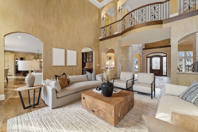 living room featuring a high ceiling