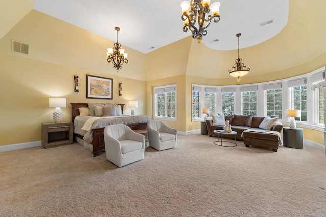 bedroom featuring light carpet, high vaulted ceiling, and an inviting chandelier