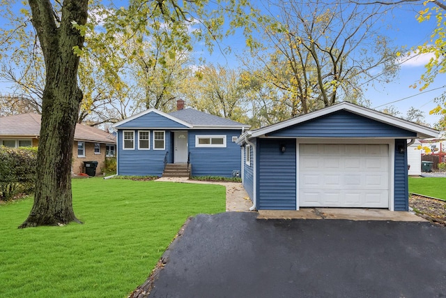 ranch-style home with a front lawn and a garage