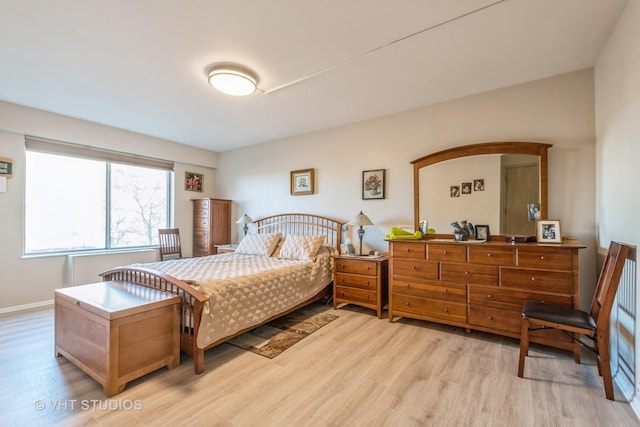 bedroom featuring light wood-type flooring