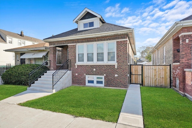 view of front of property with a front lawn