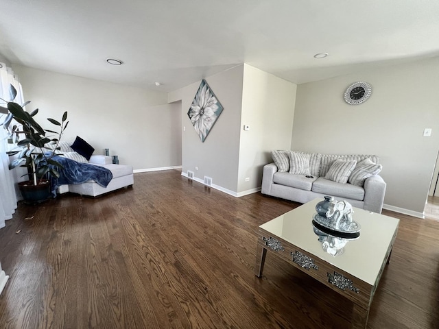 living room with dark wood-type flooring