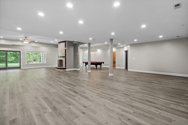 unfurnished living room with ceiling fan, pool table, and light wood-type flooring