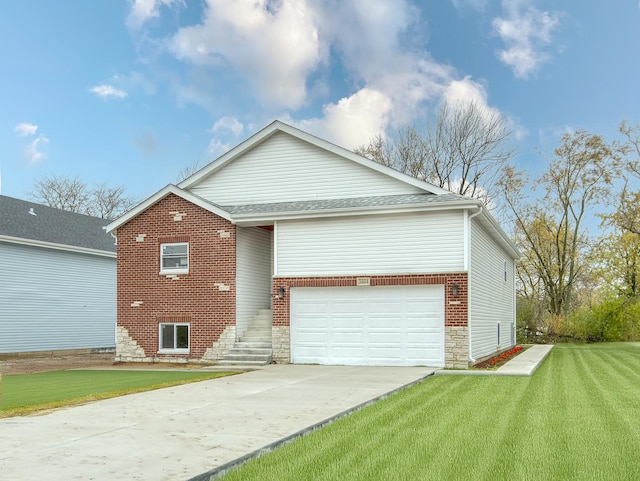 view of front facade with a garage and a front lawn