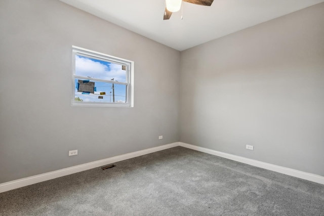 empty room with carpet flooring and ceiling fan