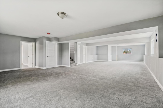 unfurnished living room with carpet floors