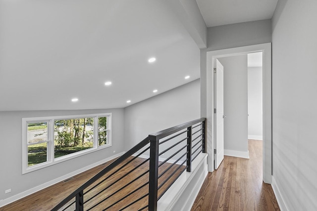 hallway with dark wood-type flooring