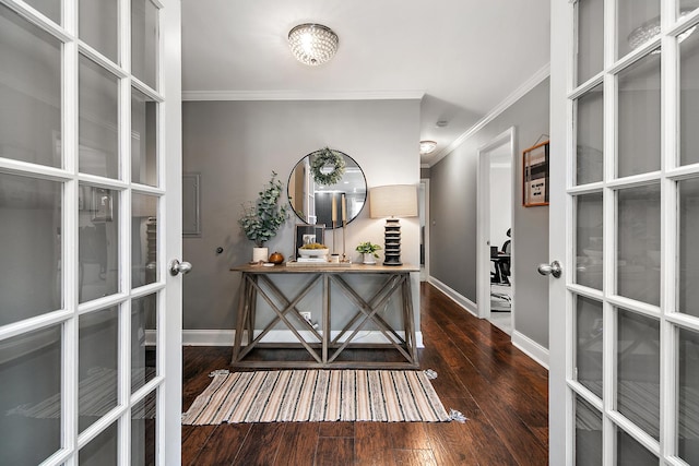 entryway with dark hardwood / wood-style flooring, french doors, and ornamental molding