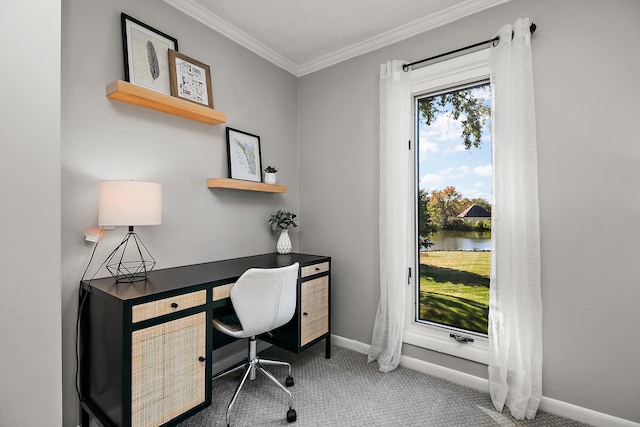 carpeted home office with a water view and crown molding