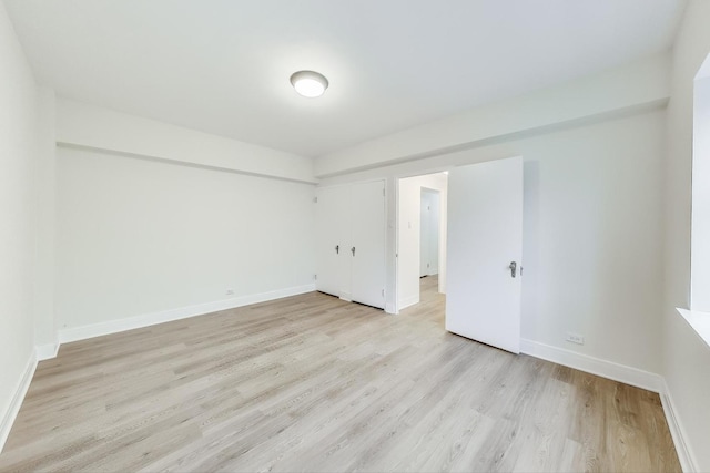 unfurnished room featuring light hardwood / wood-style flooring