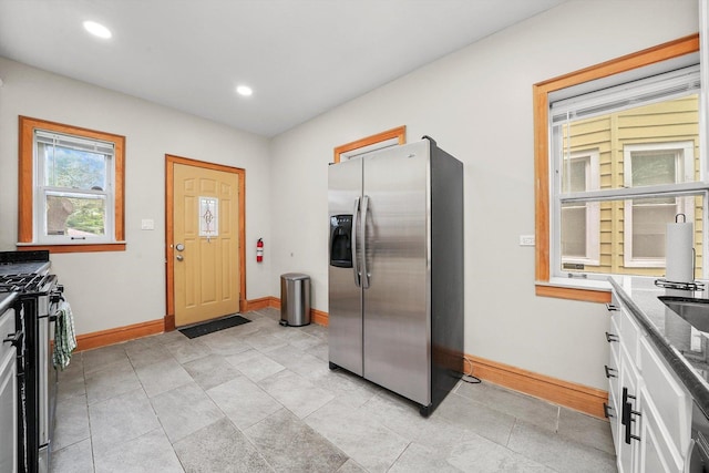 kitchen with white cabinets and stainless steel appliances