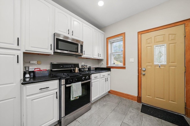 kitchen featuring white cabinets and stainless steel appliances