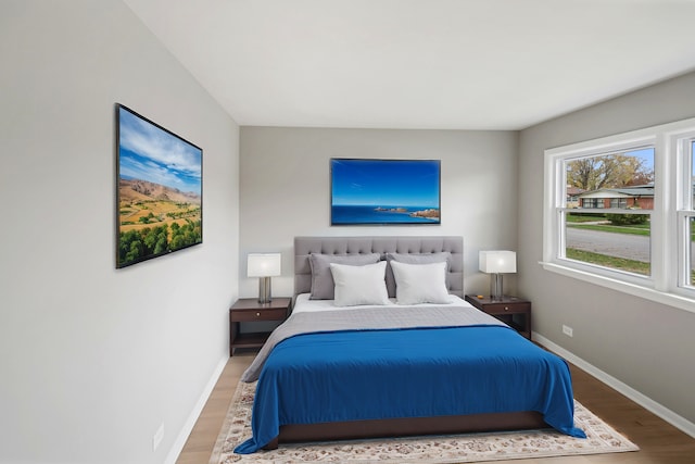 bedroom featuring hardwood / wood-style flooring