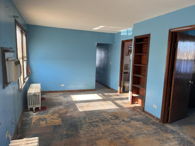 empty room featuring radiator