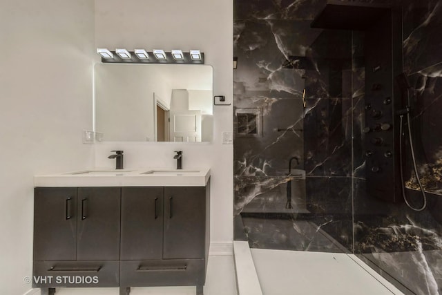 bathroom featuring vanity and walk in shower