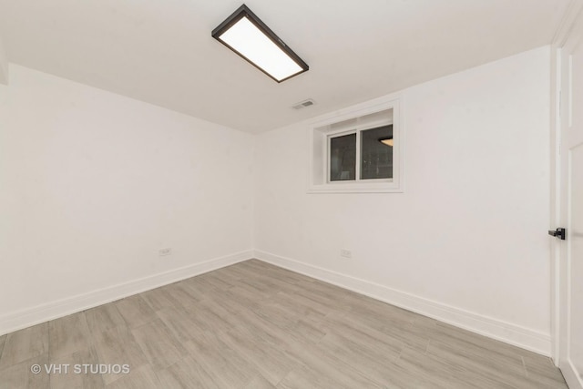 unfurnished room featuring light hardwood / wood-style flooring