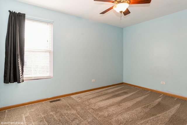 unfurnished room featuring carpet flooring and ceiling fan