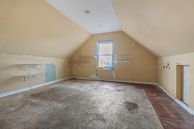 additional living space with lofted ceiling