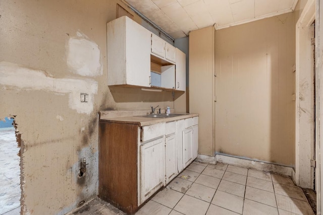 kitchen with white cabinets and sink