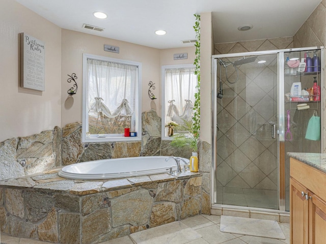 bathroom featuring vanity and plus walk in shower