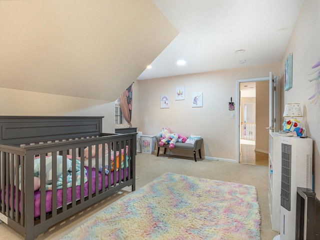 bedroom featuring light colored carpet