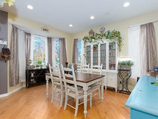 dining room featuring light hardwood / wood-style flooring