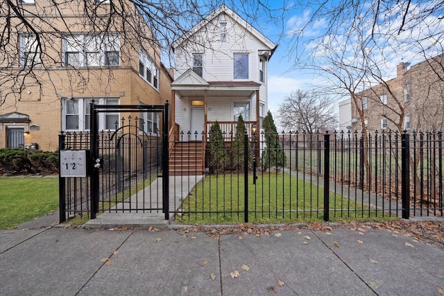 view of front facade with a front lawn