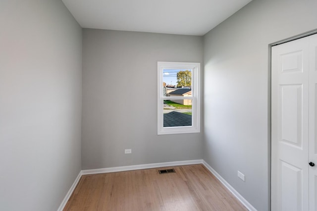 empty room featuring light hardwood / wood-style floors