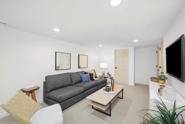 living room featuring light colored carpet