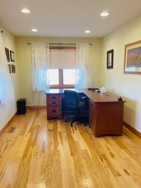 office featuring light hardwood / wood-style floors