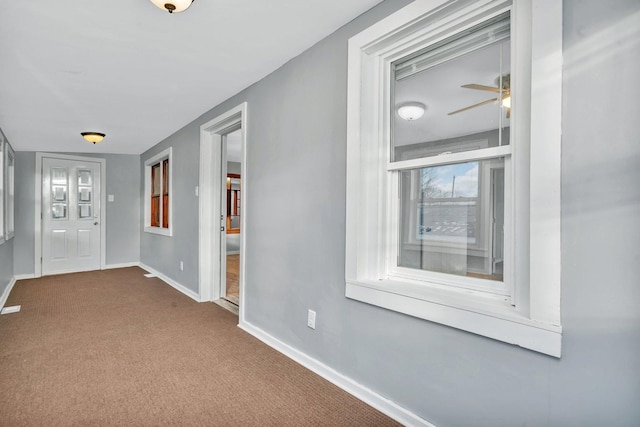 hallway with carpet