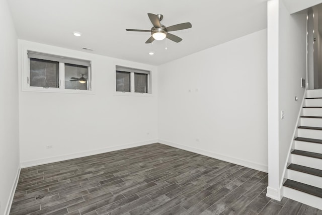 interior space featuring ceiling fan and dark wood-type flooring