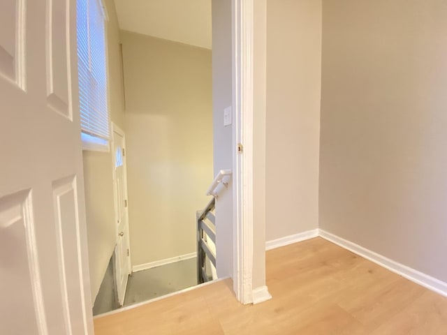 staircase featuring hardwood / wood-style floors