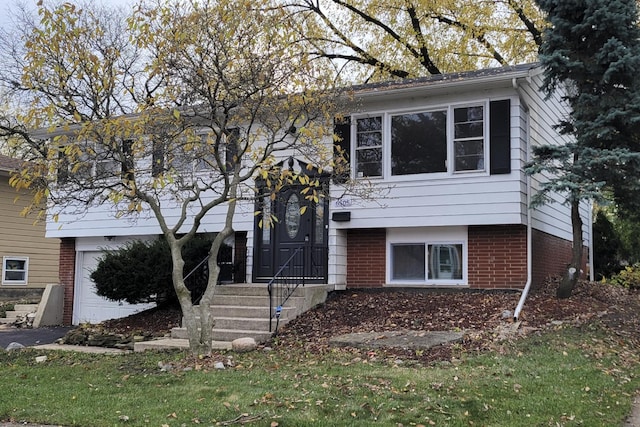 split foyer home featuring a garage