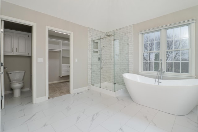 bathroom with separate shower and tub and toilet