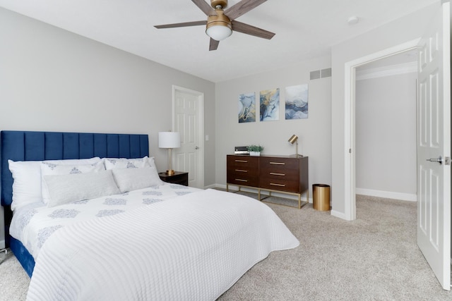 carpeted bedroom featuring ceiling fan