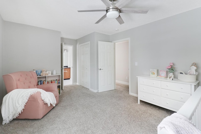 carpeted bedroom with ceiling fan